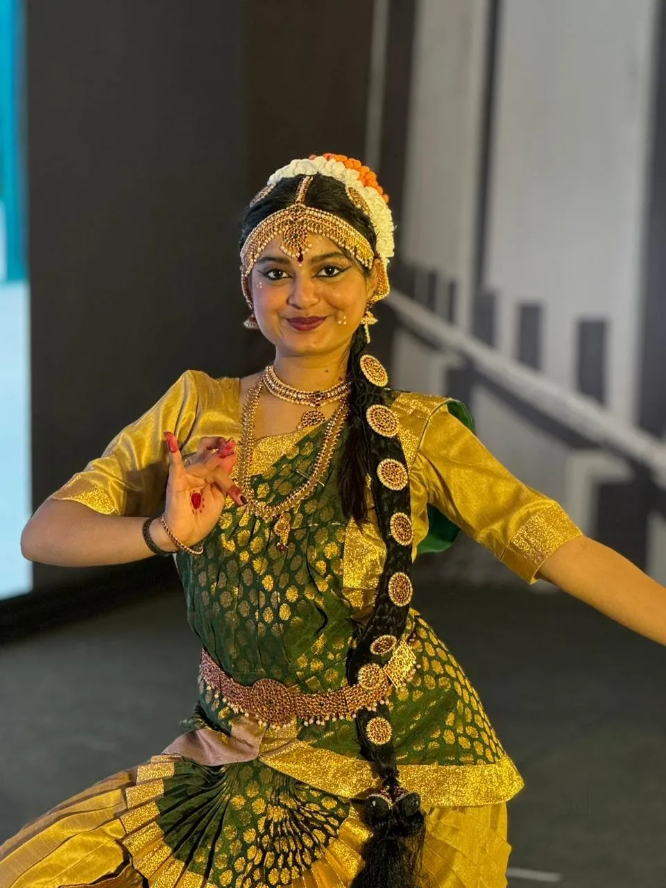 A Bharatanatyam dancer from Aaharyam in a mudra pose